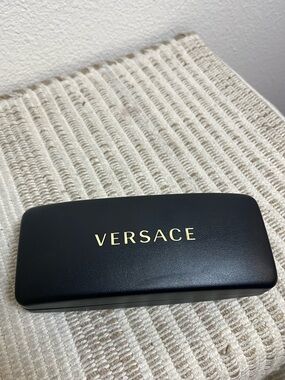 Versace Black Case with Gold Lettering